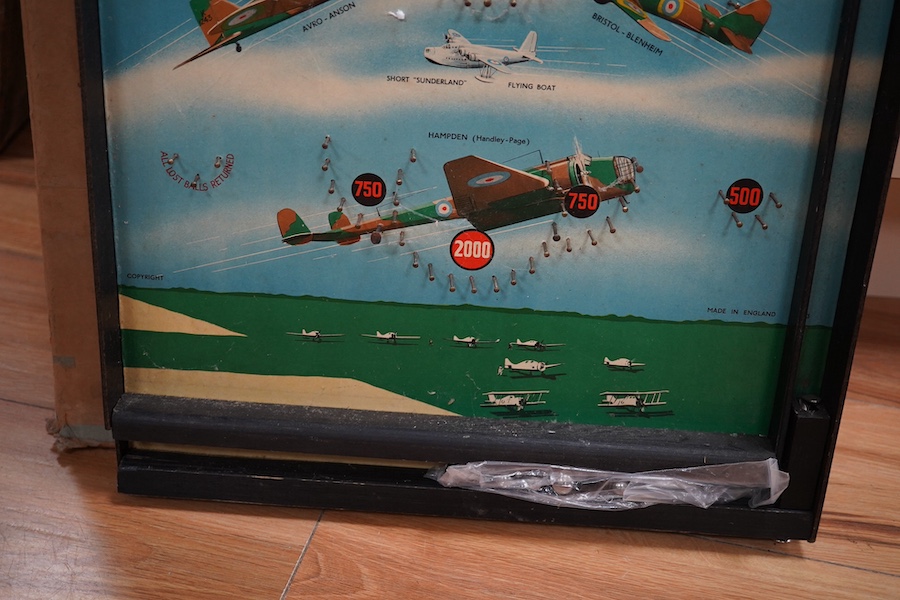 WWII aviation interest; a 1940s bagatelle table pinball game by Kay, Made in England, entitled ‘Sons of the Air’, of hardboard construction, with applied paper surface with images of 1940s RAF aircraft, including a Hawke